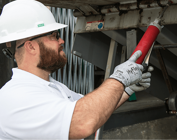 truesource technician working on a leveler